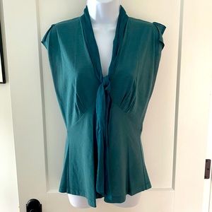Diane vonFurstnberg green/blue sleeveless blouse.